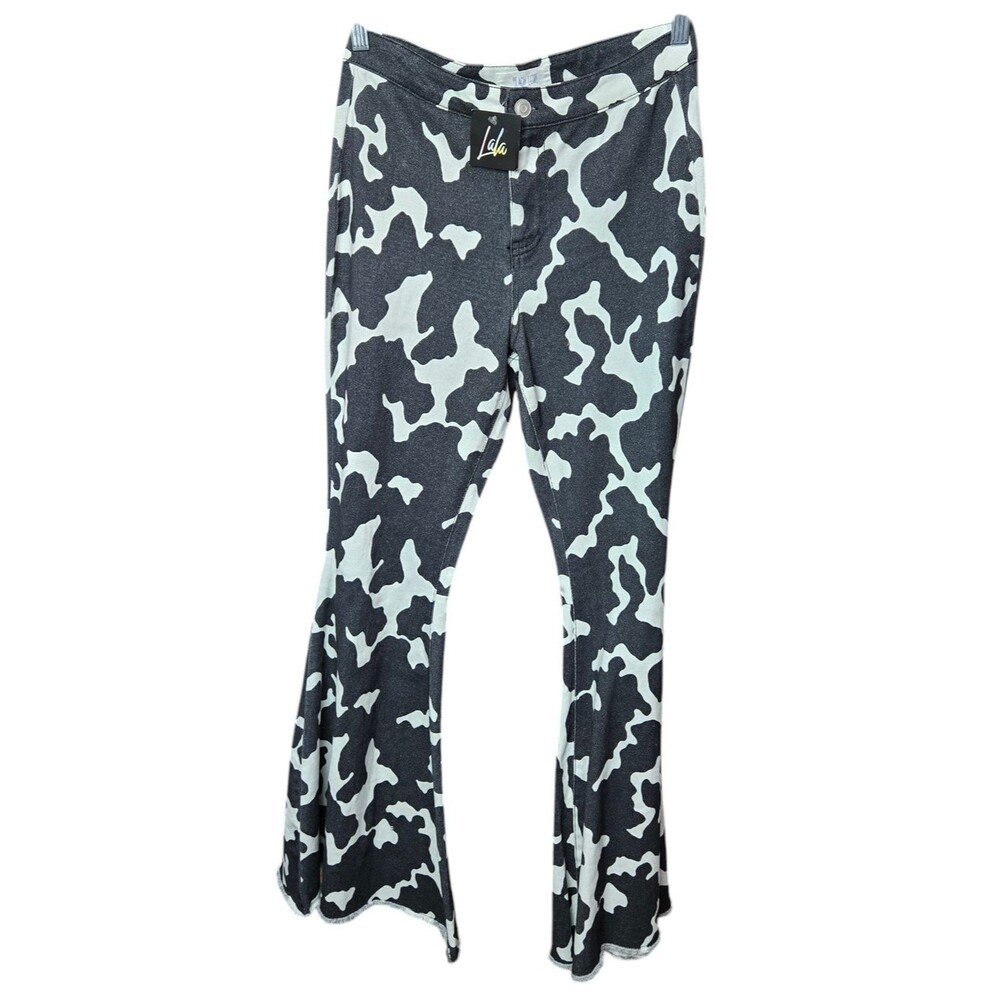 Peach Love Lala Black and White Cow Print Flared Bottom Jeans